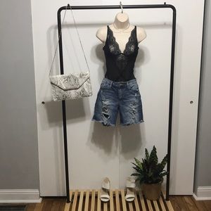 Distressed denim shorts